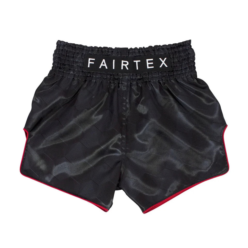 Black Muay Thai shorts with red trim and Fairtex branding on a white background