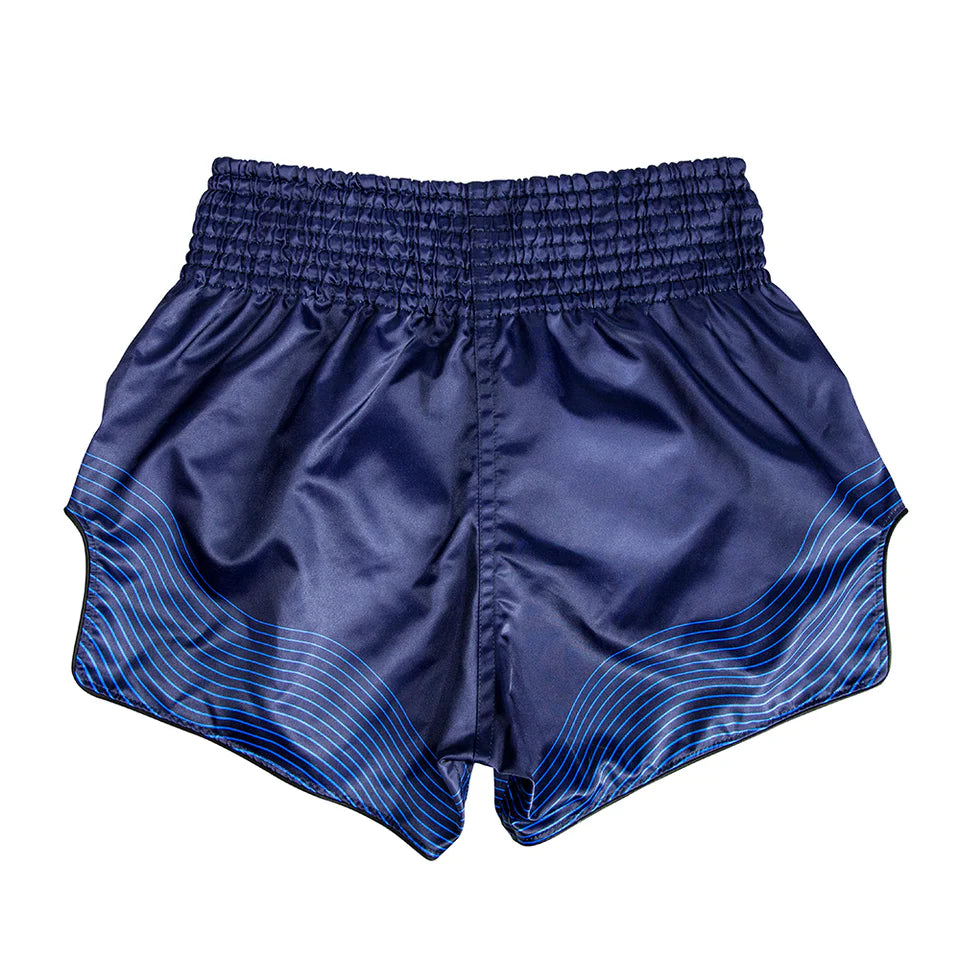 Navy blue Muay Thai shorts with a textured waistband on a white background