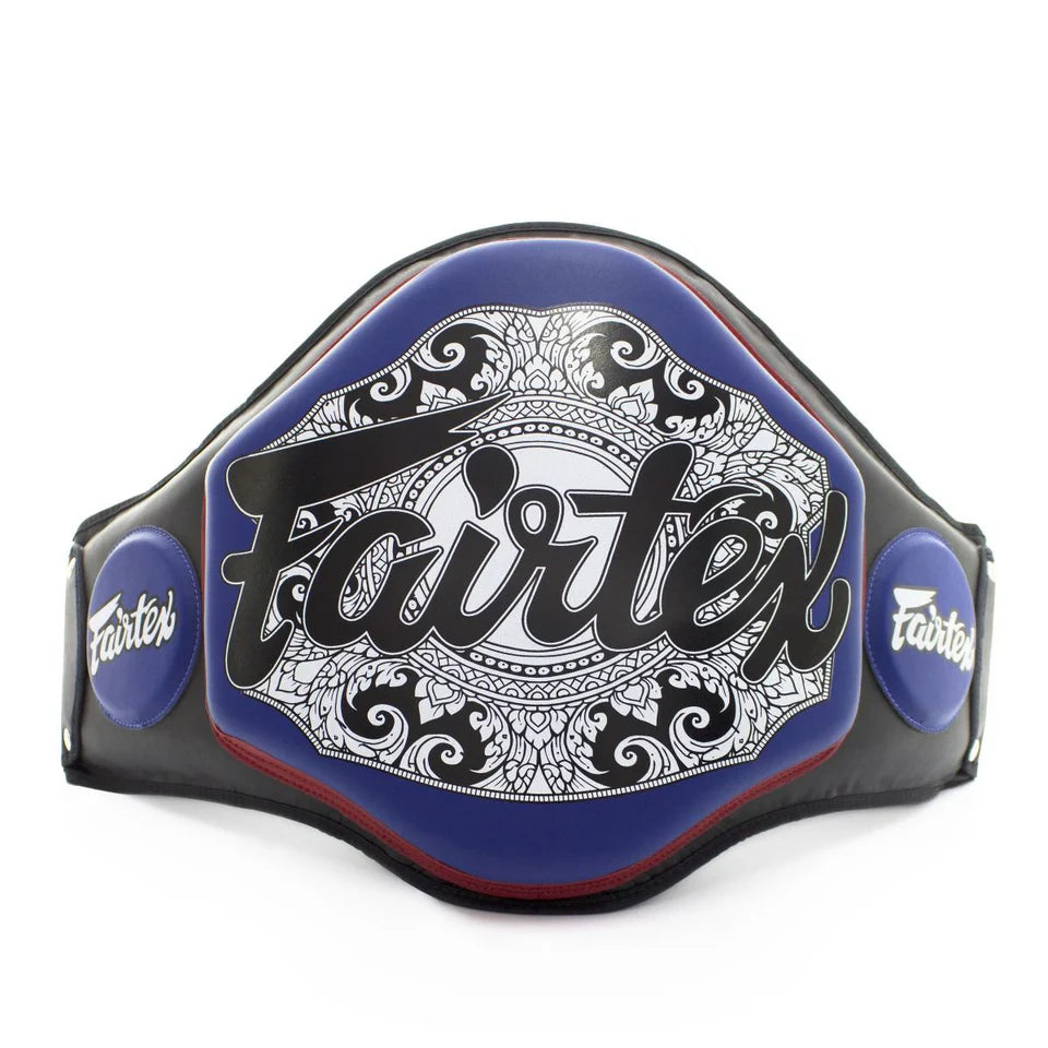 Fairtex boxing belly pad with intricate design and blue accents on a white background