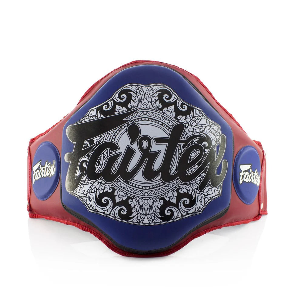 Red and blue belly pad with 'Fairtex' branding on a white background
