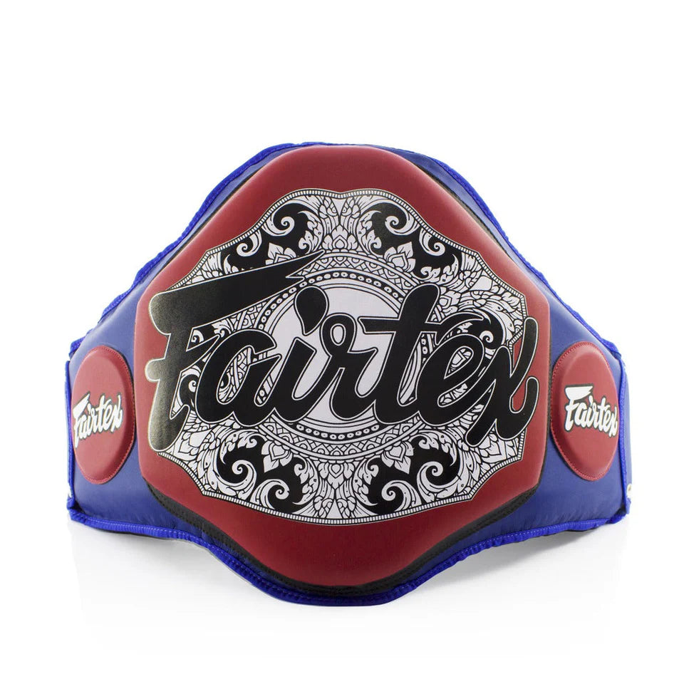 Red and blue belly pad with Fairtex logo on a white background
