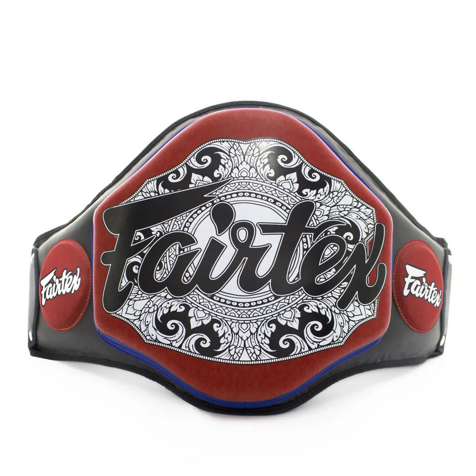 Fairtex belly pad with intricate design on a white background