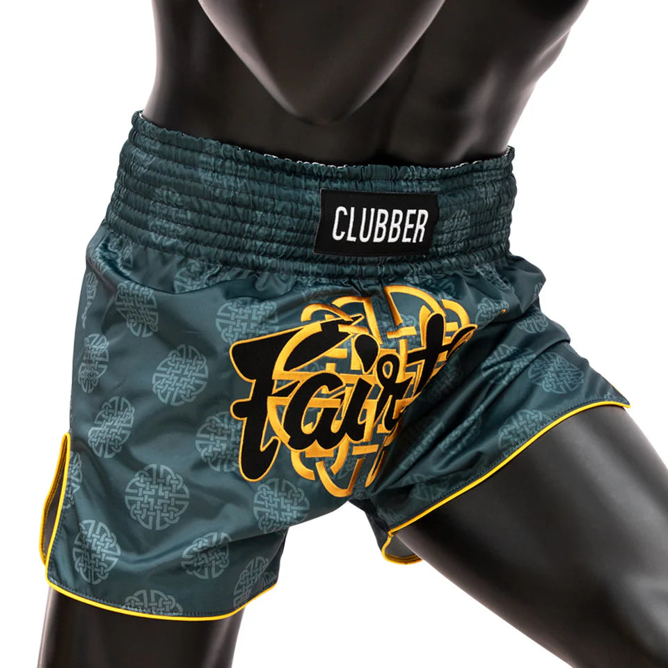 Green Muay Thai shorts with 'Fair' and 'Clubber' branding on a white background