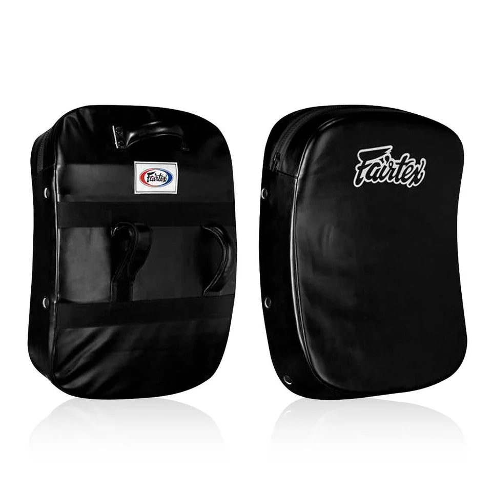 Black kick shield with Fairtex logo on a white background