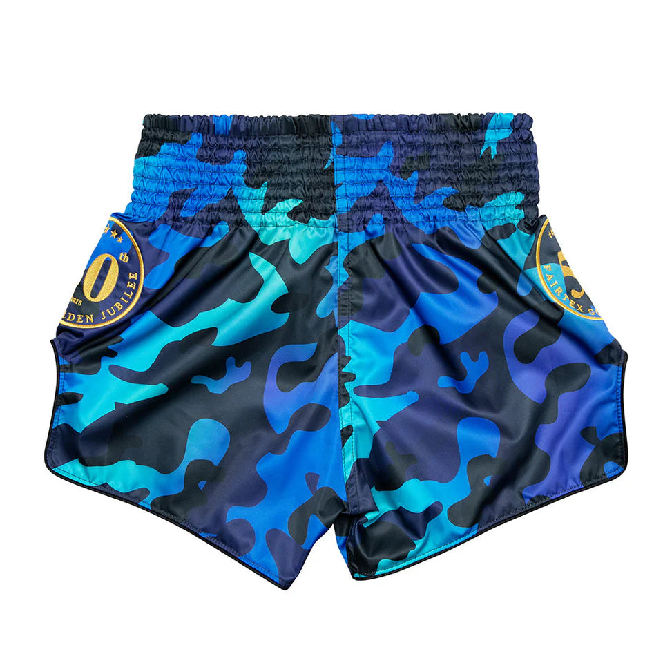 Blue and black camouflage Muay Thai shorts with a brand logo on a white background