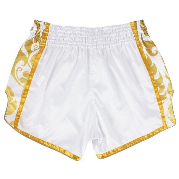 White Muay Thai shorts with gold decorative trim on a white background