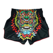 Black Muay Thai shorts with a colorful dragon design on a white background