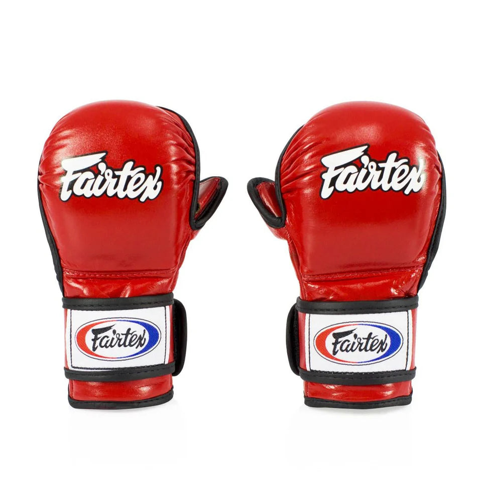 Red sparring gloves with Fairtex logo on a white background