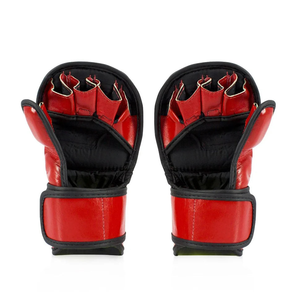 Pair of red and black MMA sparring gloves on a white background