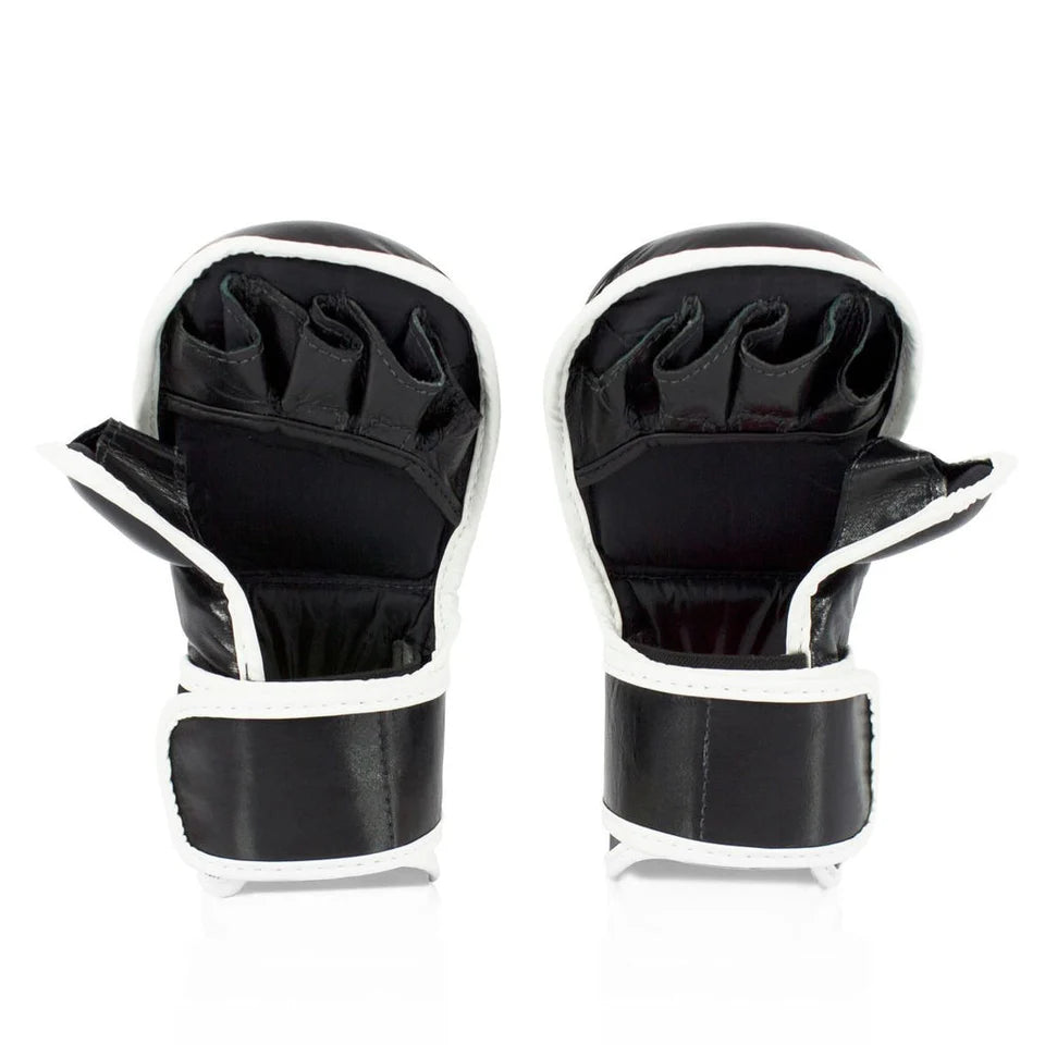 Pair of black and white MMA sparring gloves on a white background