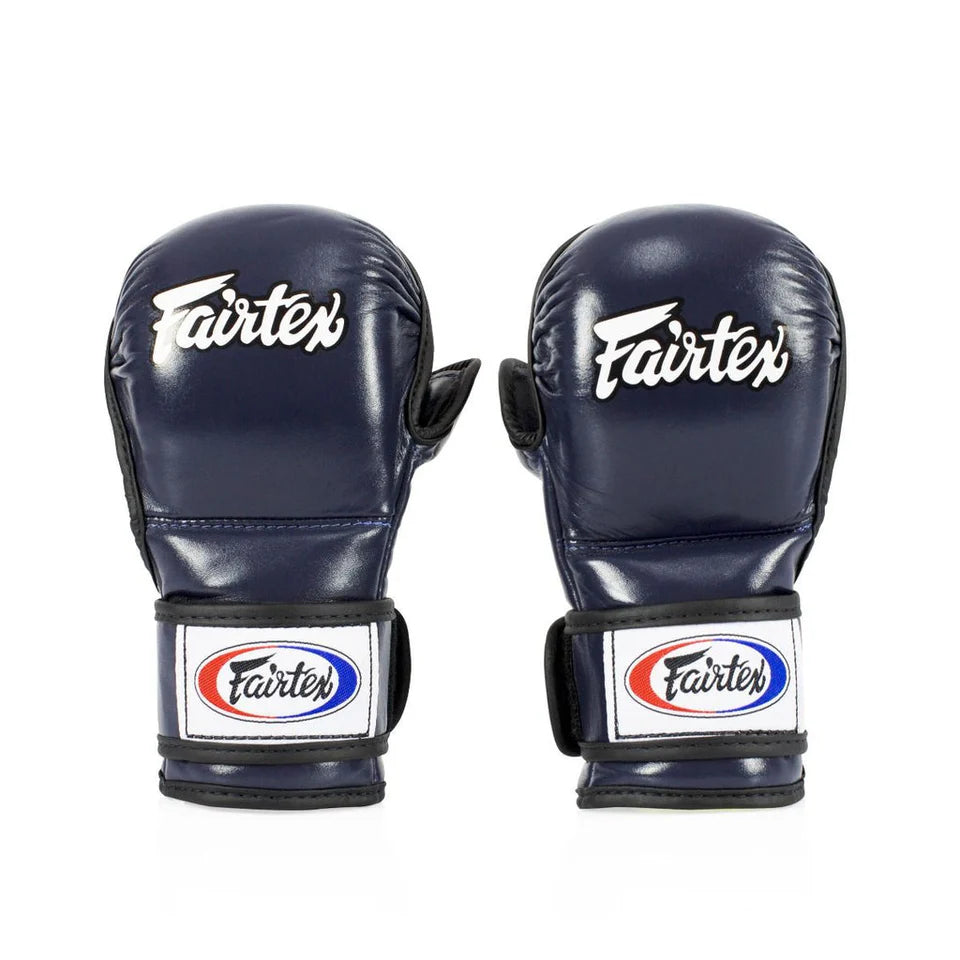 Pair of navy blue Fairtex MMA sparring gloves on a white background