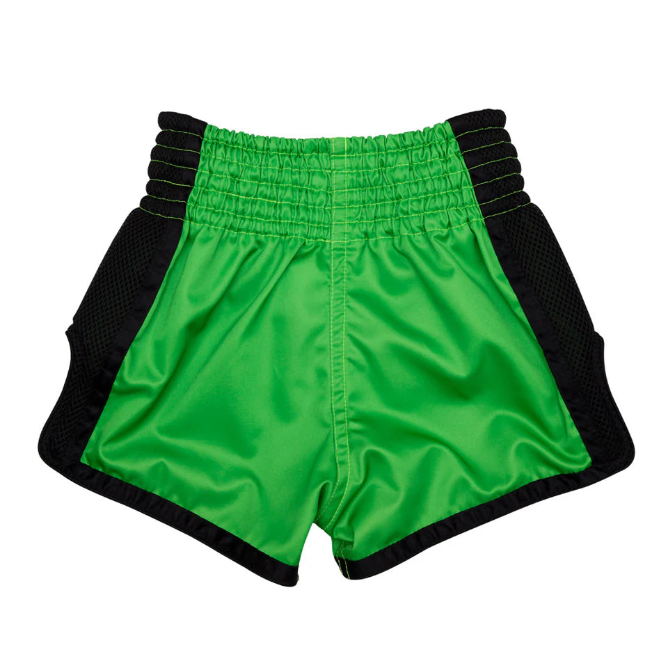 Green Muay Thai shorts with black accents on a white background