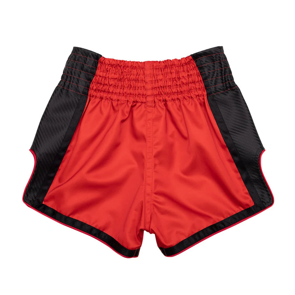 Red Muay Thai shorts with black trim on a white background