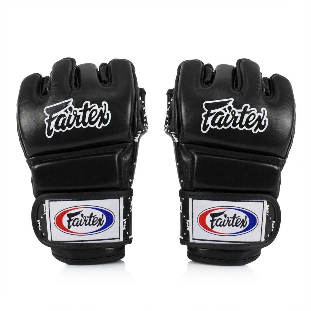 Pair of black Fairtex MMA gloves on a white background