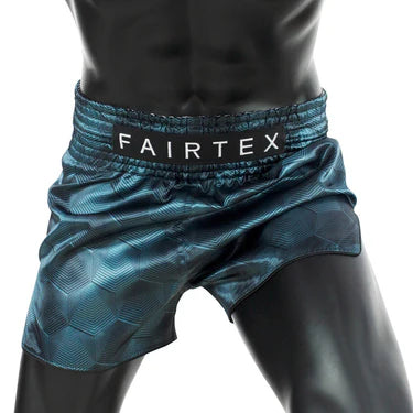 Teal Fairtex shorts worn by a person on a white background
