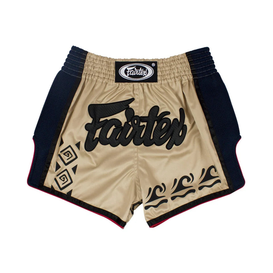 Beige Muay Thai shorts with black Fairtex logo on a white background