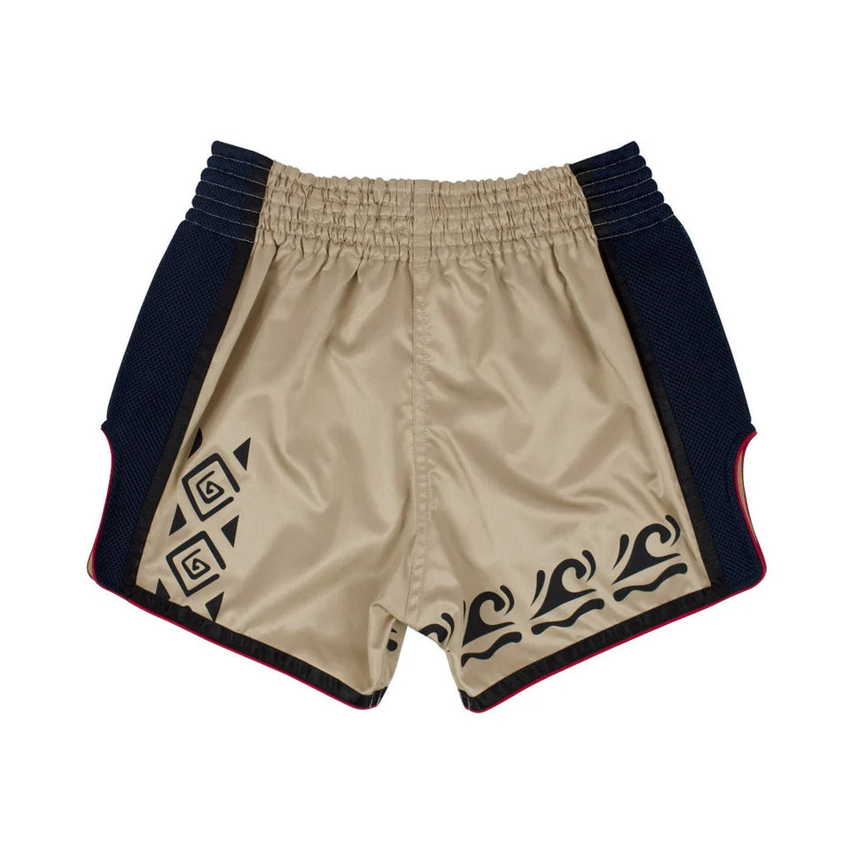 Beige Muay Thai shorts with black patterns and navy accents on a white background