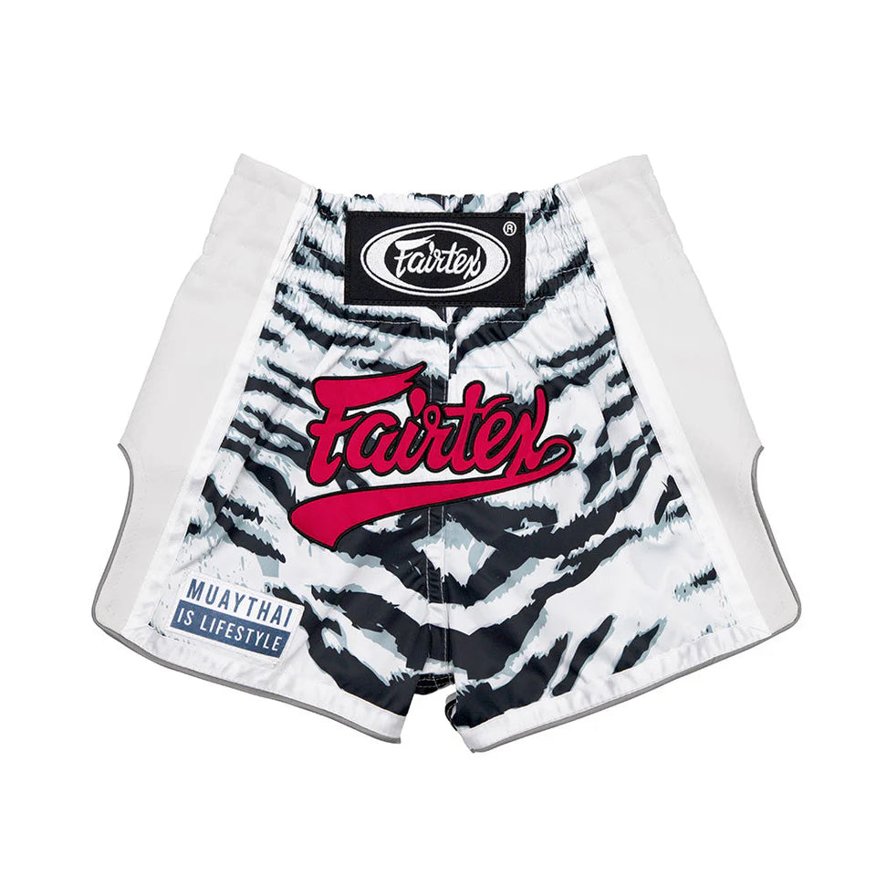 White and black tiger stripe patterned shorts with Fairtex branding on a white background