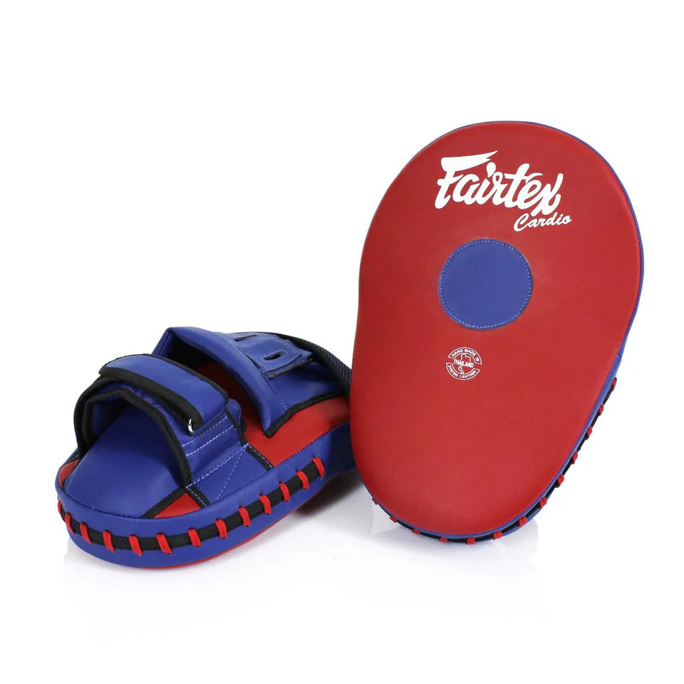 Red and blue boxing focus mitts with Fairtex logo on a white background