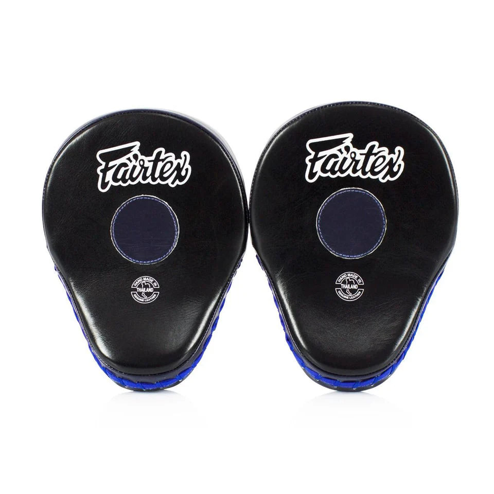Pair of black and blue Fairtex focus mitts on a white background