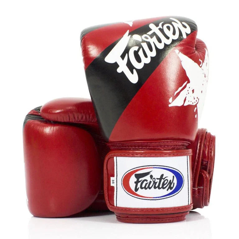 Red boxing glove with Fairtex branding on a white background