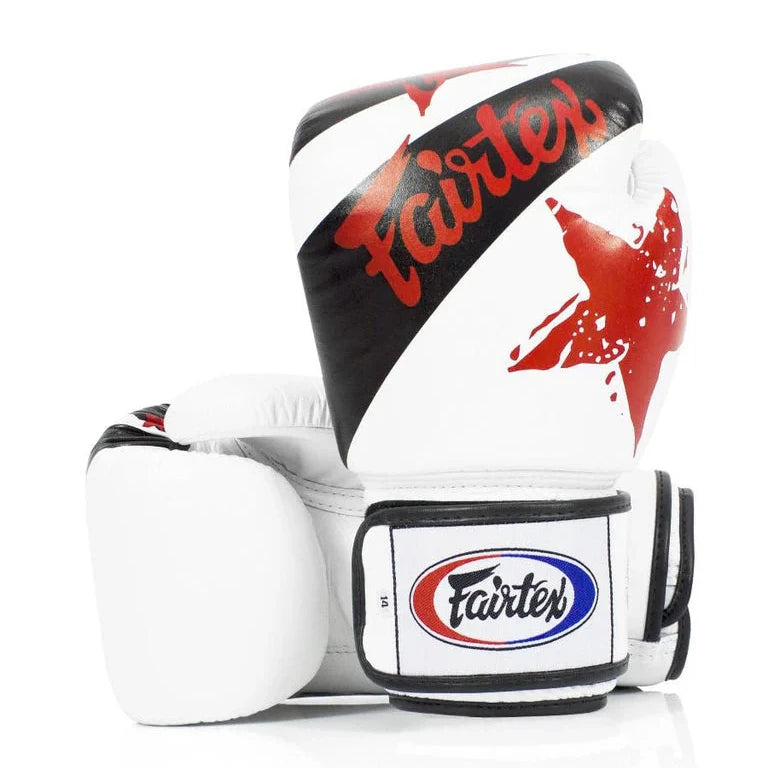 White boxing glove with black and red design featuring Fairtex logo on a white background