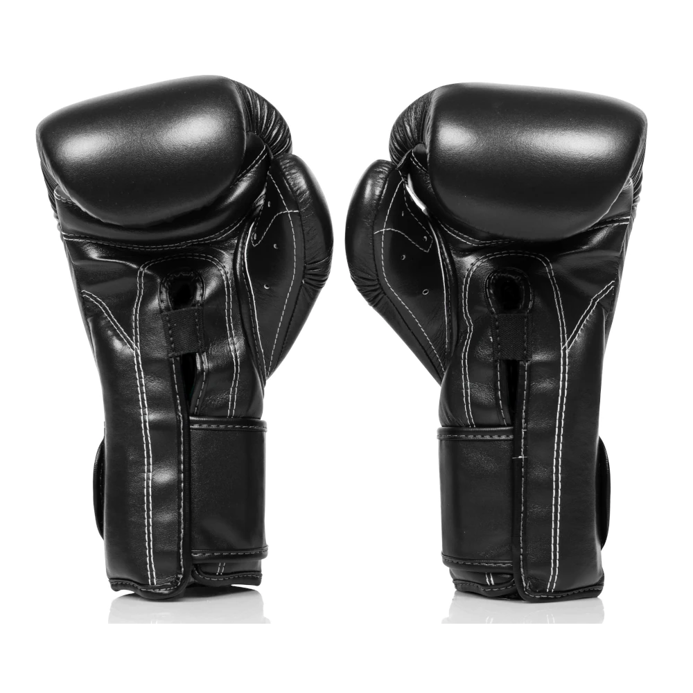 Palm side view of a pair of black Fairtex boxing gloves on a white background