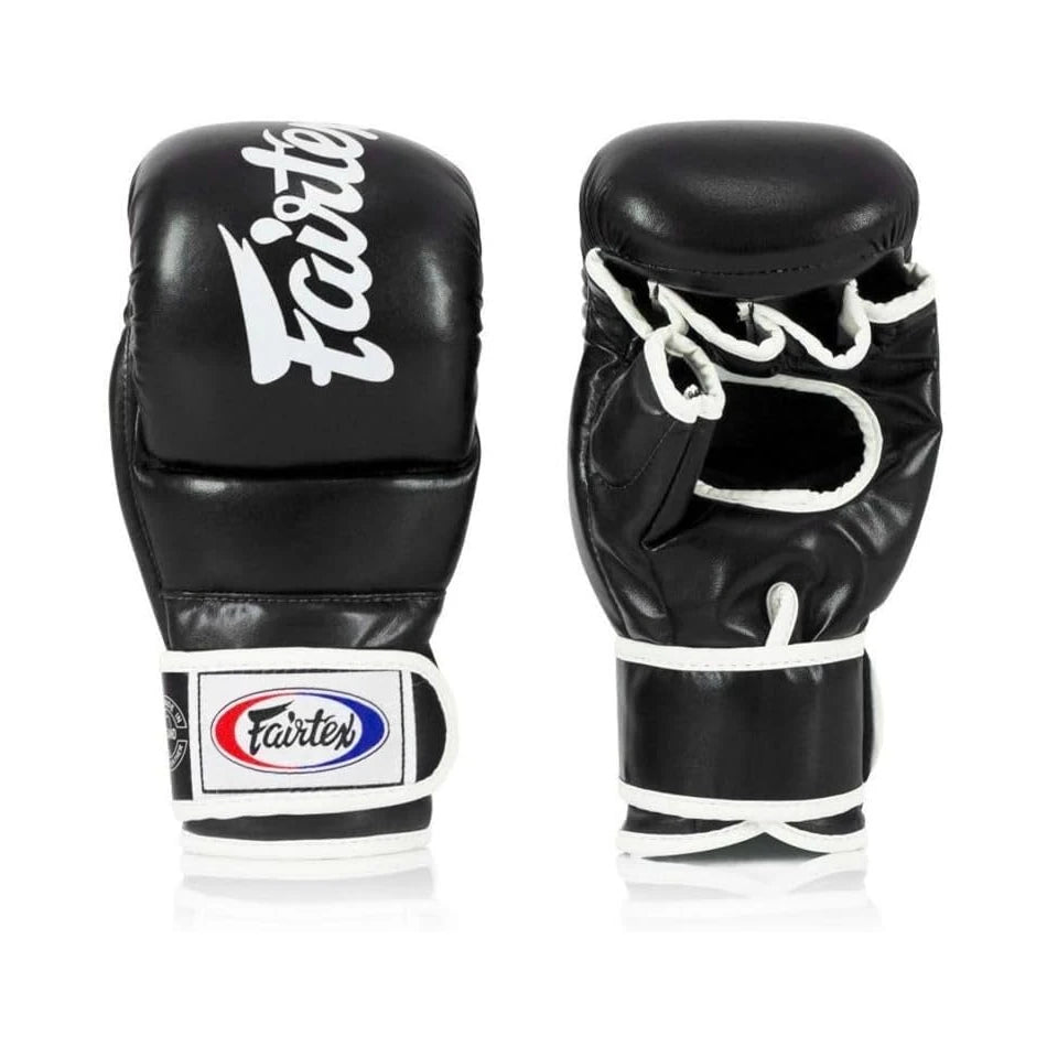 Pair of black MMA sparring gloves with Fairtex branding on a white background