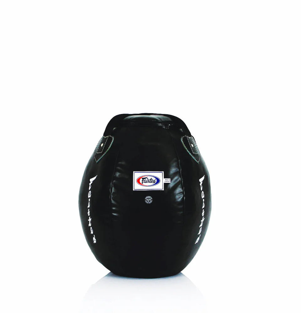 Round black boxing bag with a Fairtex logo on a white background