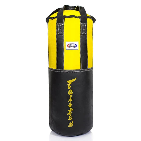Yellow and black punching bag with 'Fairtex' branding on a white background