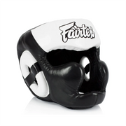 Black and white boxing headgear with 'Fairtex' branding on a white background