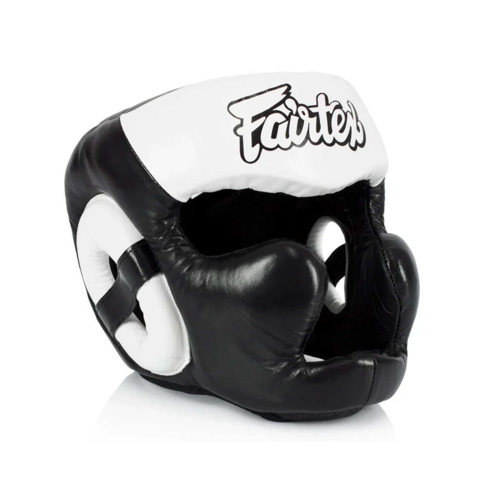 Black and white boxing headgear with 'Fairtex' branding on a white background