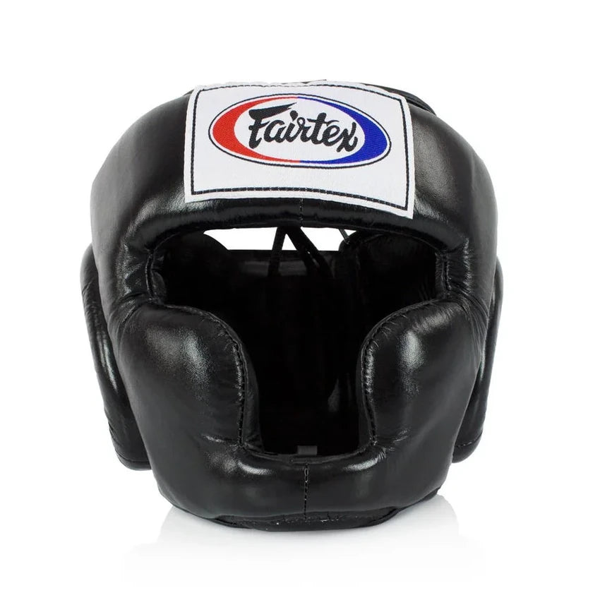 Black boxing headgear with Fairtex logo on a white background
