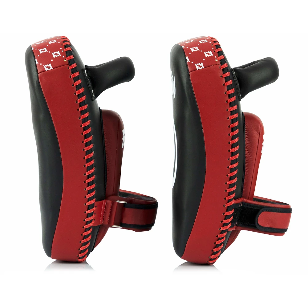 Red and black side profile of 2 Fairtex Muay Thai pads on a white background