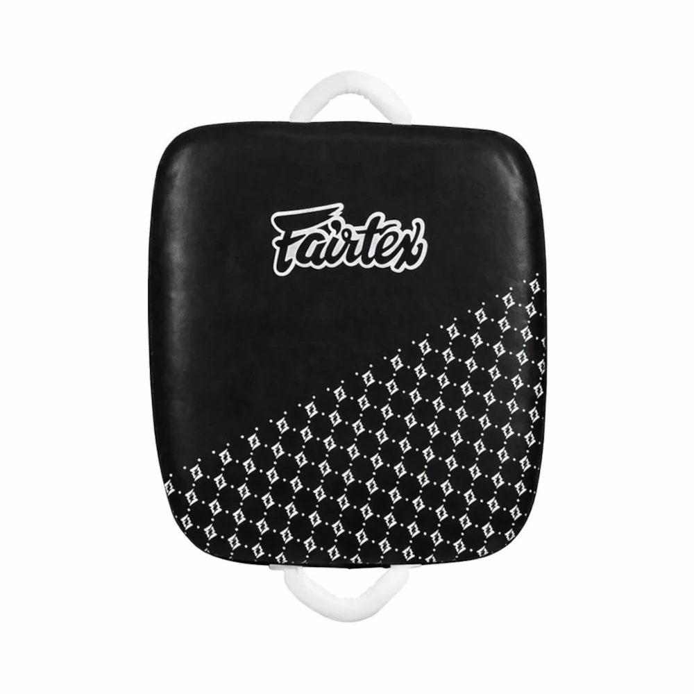 Black and white kick shield with 'Fairtex' branding on a white background