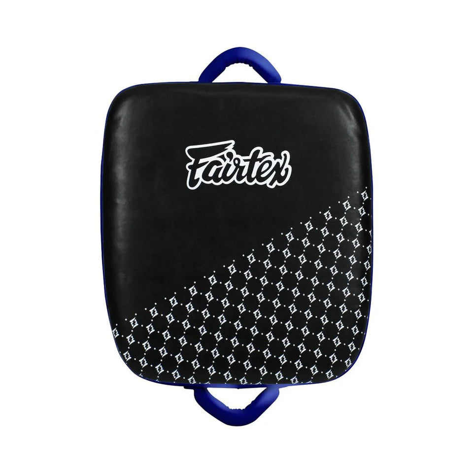 Black and blue Muay Thai kick shield pad with 'Fairtex' logo on a white background