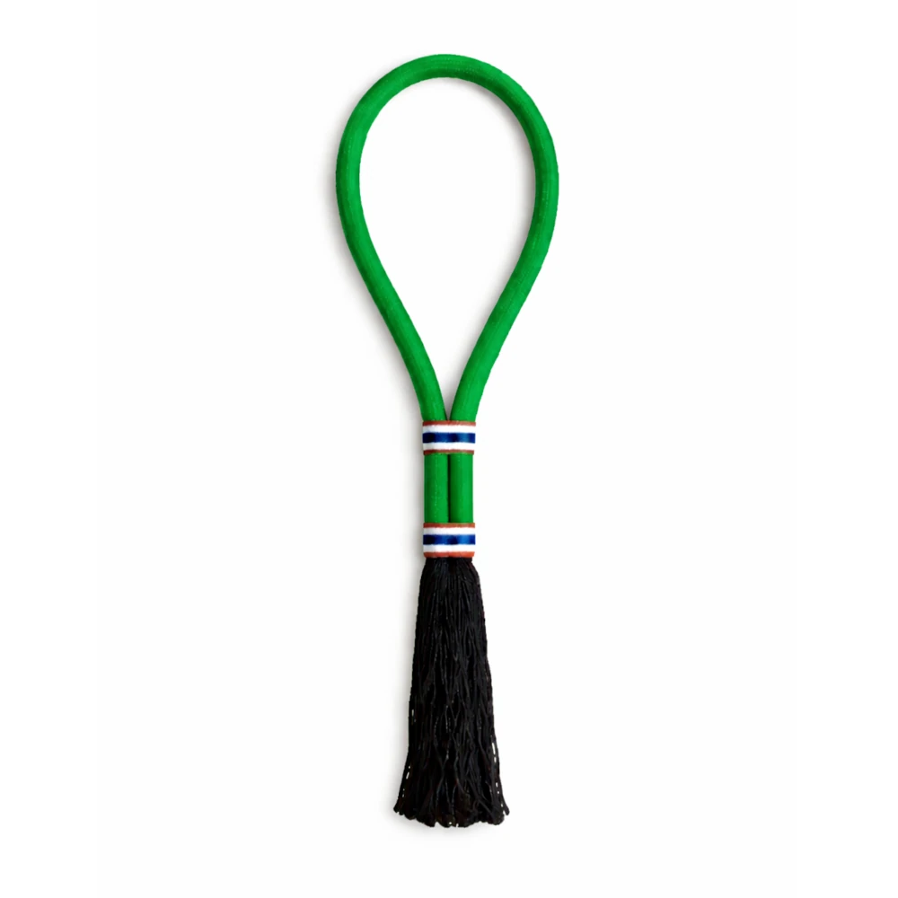 Green mongkon with black tassel on a white background