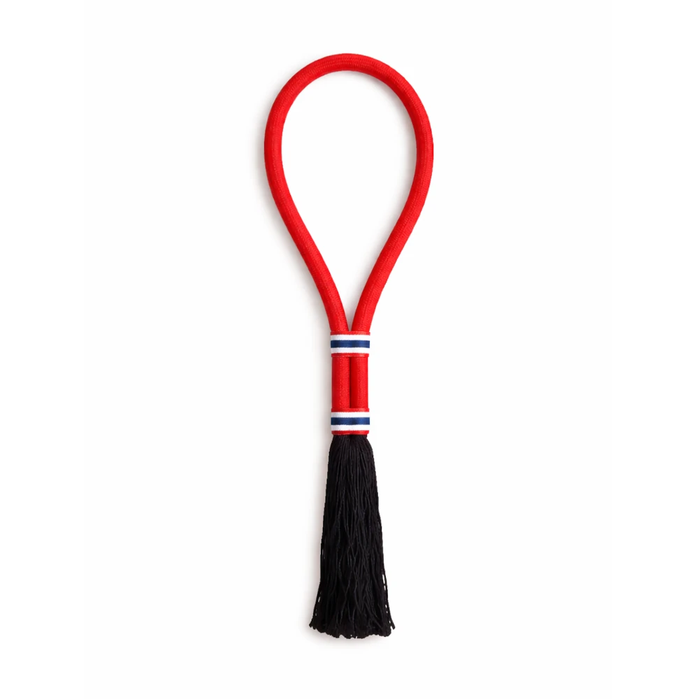 Red mongkon with black tassel on a white background