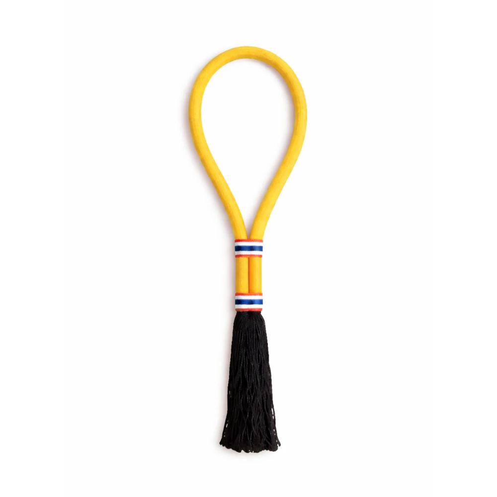 Yellow mongkon with black tassel on a white background