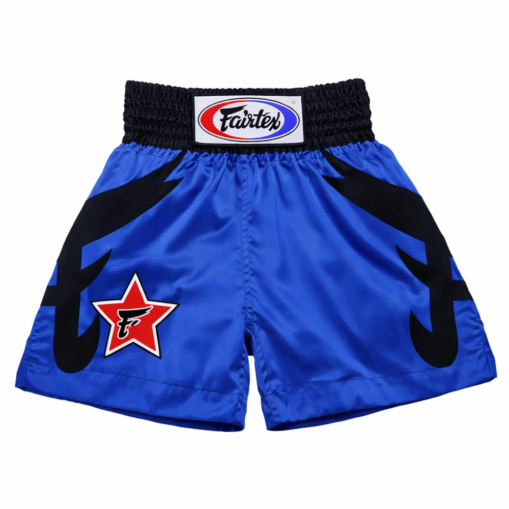 Blue boxing shorts with black designs and a red star logo on a white background, featuring the Fairtex brand.