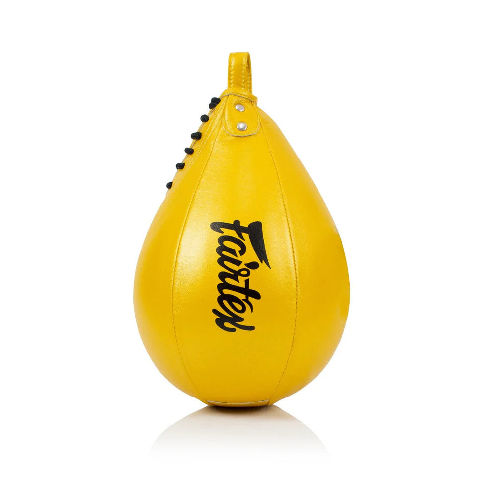 Yellow speed bag with 'Fairtex' branding on a white background