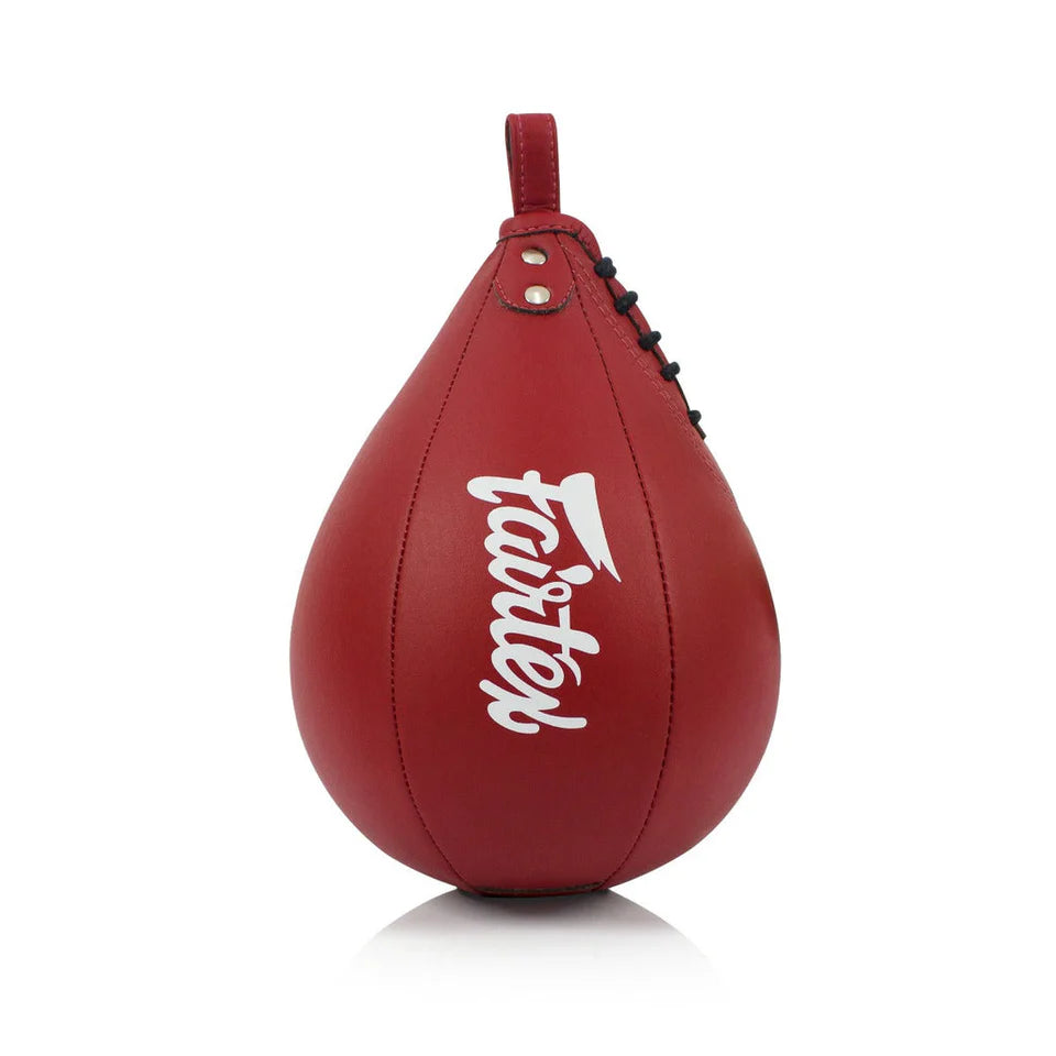Red boxing speed bag with 'fairtex' branding on a white background