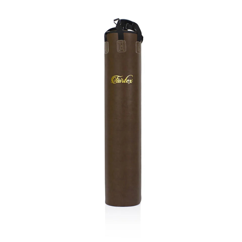Vintage brown punching bag with Fairtex logo on a white background