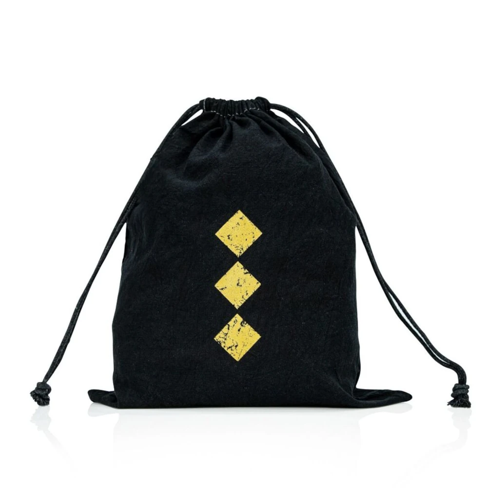 Black drawstring bag with yellow diamond patterns on a white background