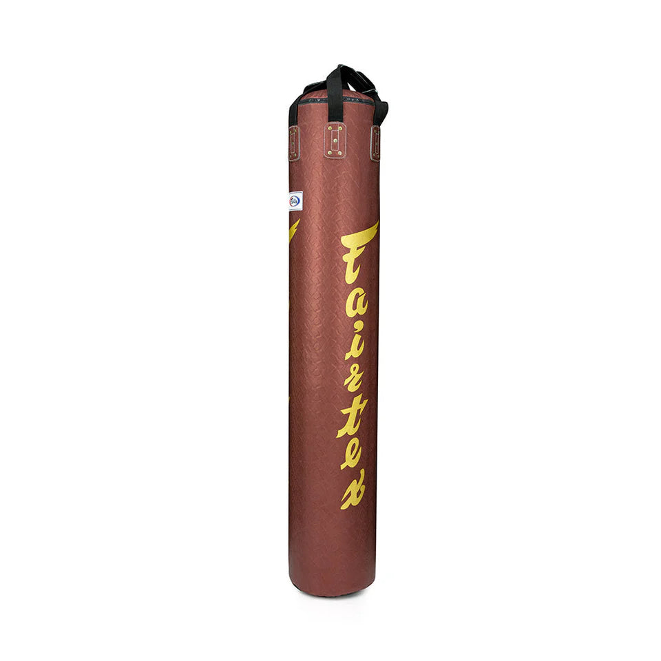 Brown punching bag with yellow 'Fairtex' text on a white background