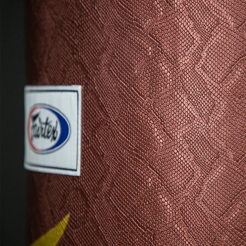Close-up of a textured brown surface with a 'Fairtex' brand label.