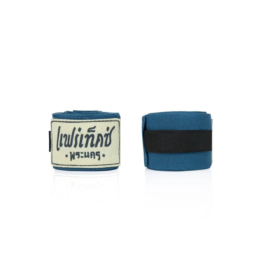 Two blue hand wraps with a brand label on a white background