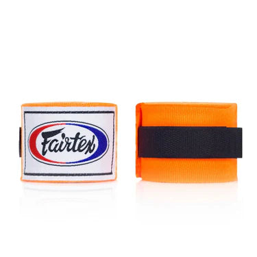 Orange boxing hand wraps with Fairtex logo on a white background