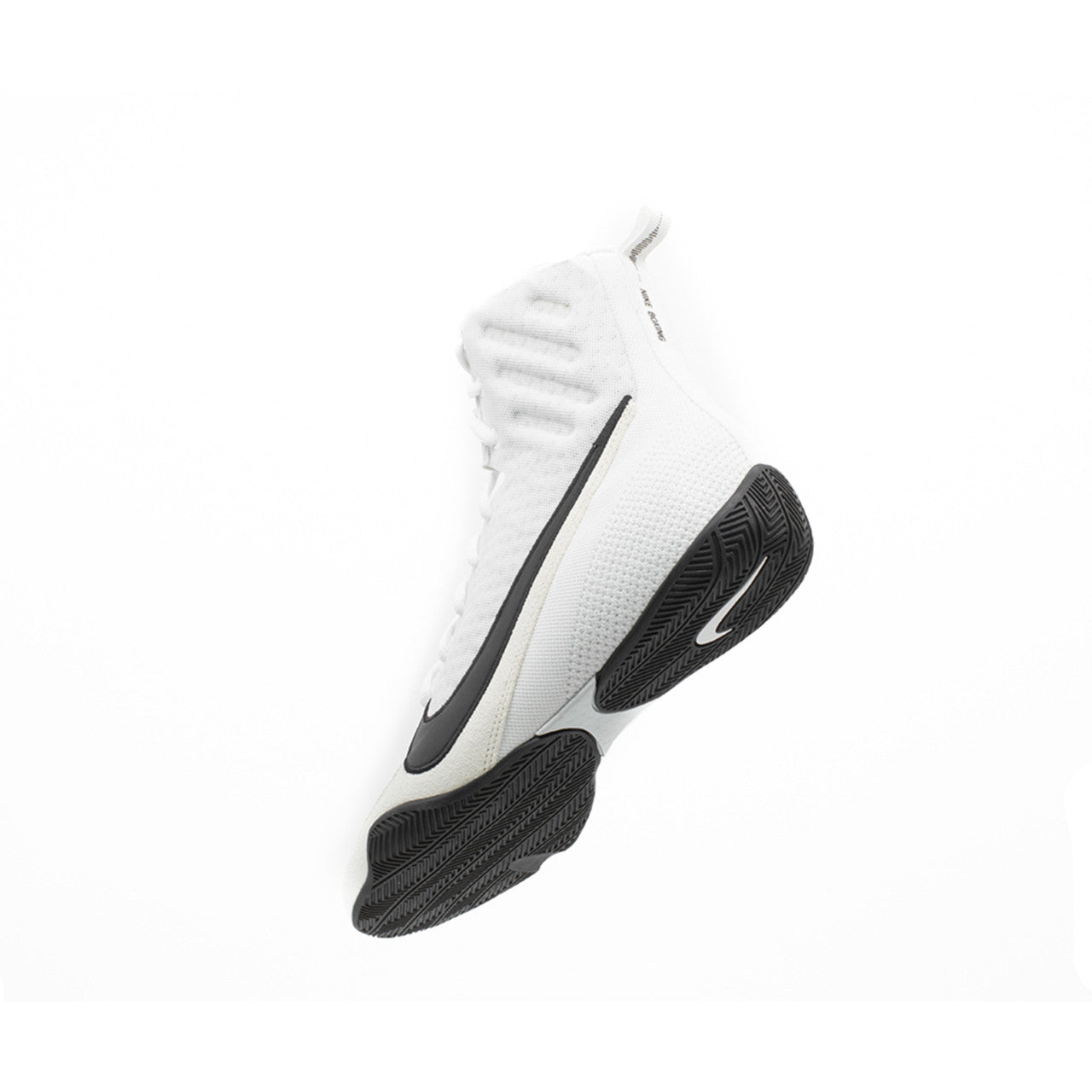 A white high-top Nike boxing shoe with black accents on the swoosh and outsole, shown from a side profile against a white background.