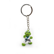 Green dragon keychain with a black belt on a white background